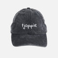 Black cap with 'tjoppie' embroidered on a white background